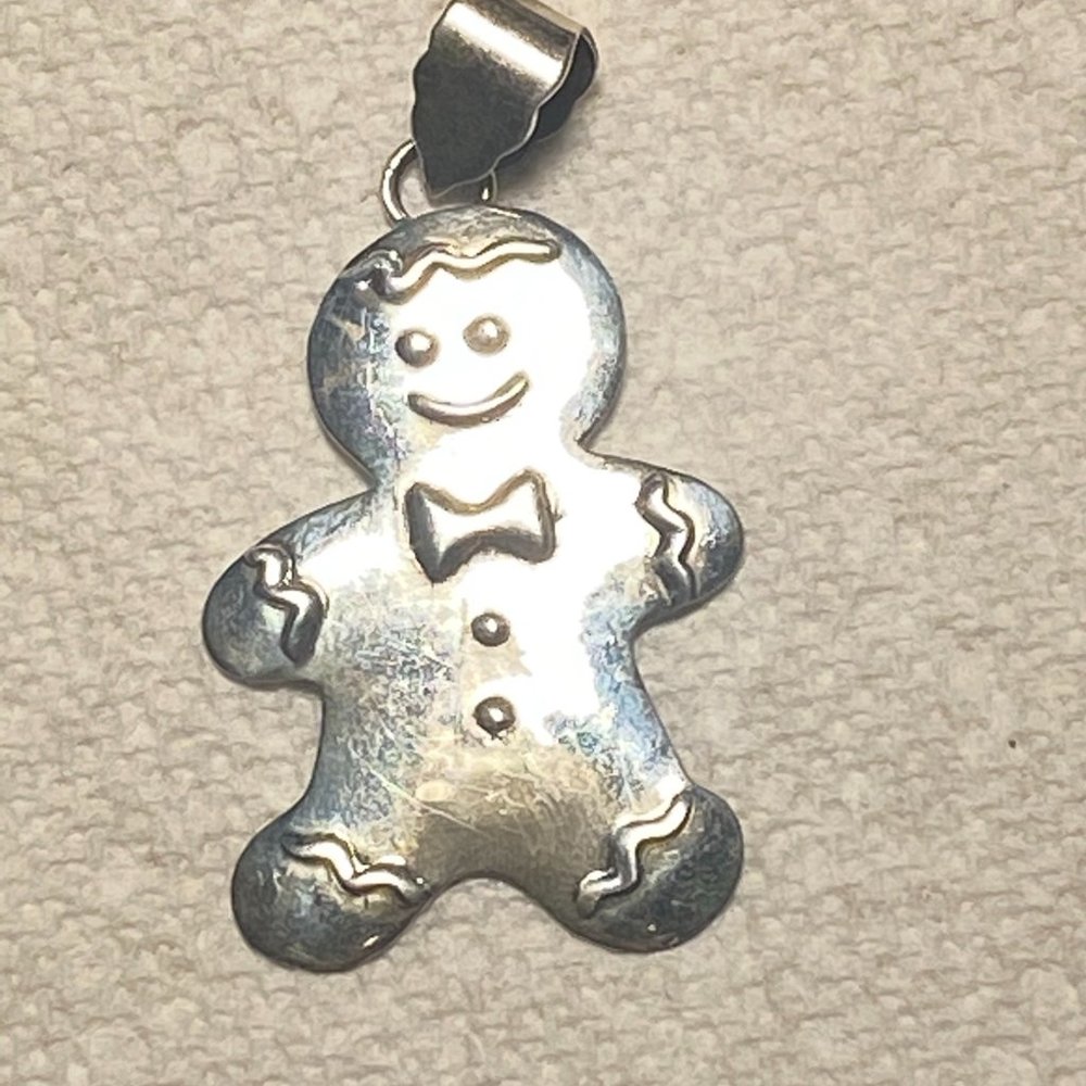 Sterling silver gingerbread man pendant